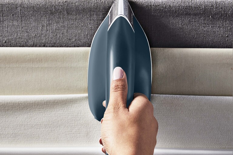 Rengöra strykjärn undersida